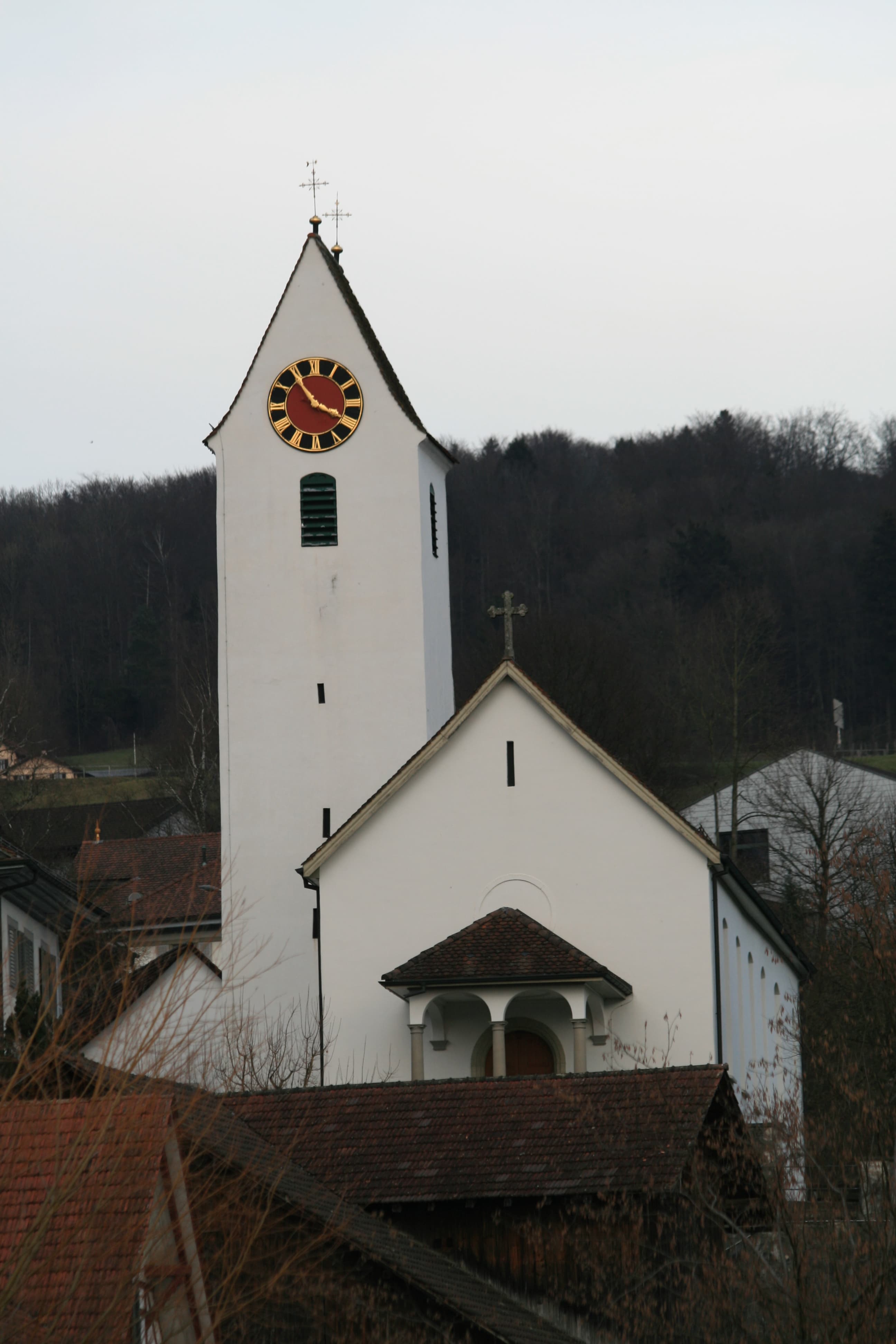roman catholic parish church with cemetery wall
