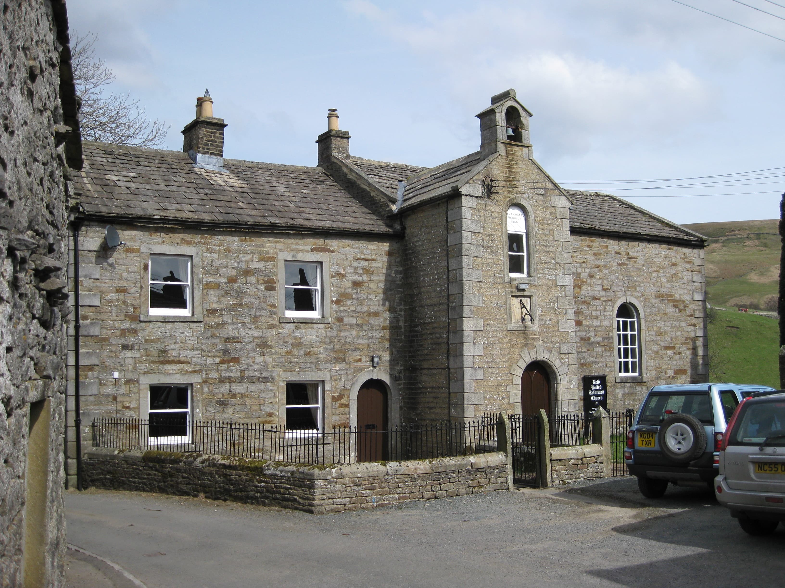 United Reform Church and former manse, with railings