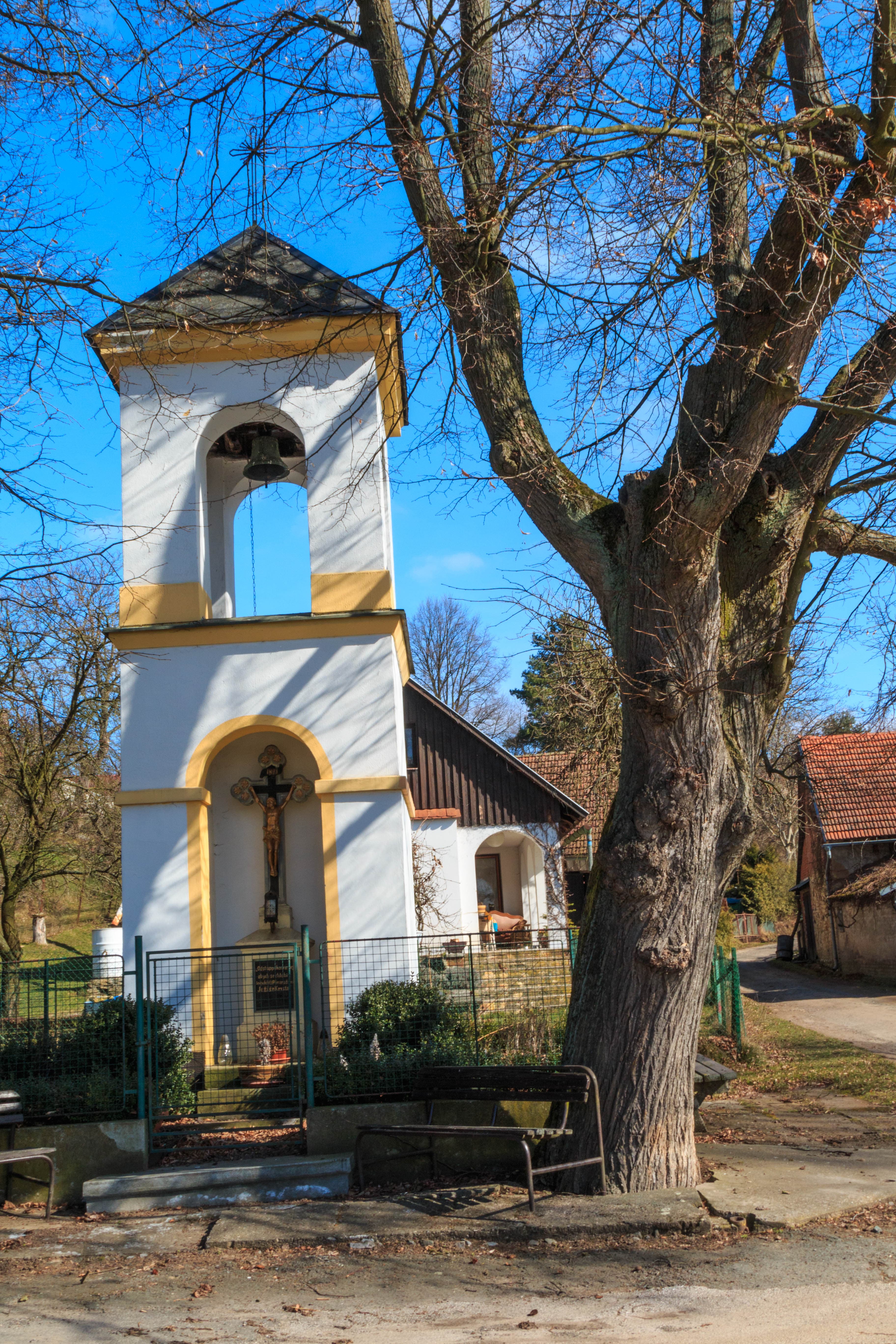 Bell tower with cross in Kozodry